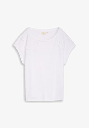 Biała bluzka z krótkim rękawem i okrągłym dekoltem, subtelne kwiatowe haftowane oczka przy ramionach i luźny krój.