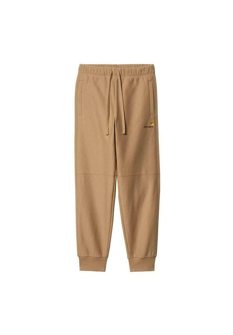 Pantalons de survêtement en coton beige avec une taille élastique, deux poches latérales et un petit logo jaune sur la cuisse gauche. Ourlets aux chevilles.