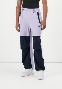 Nike Sportswear - TECH WOVEN PANT - Tracksuit bottoms - hydrangeas/obsidian Thumbnail Image 1