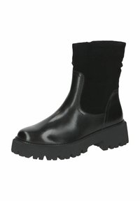 Botín negro con parte superior de cuero brillante y un eje de tela suave y texturizada. Suela de goma gruesa y estriada que proporciona tracción y durabilidad.