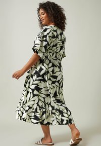 Evans LEAF PRINT DIPPED HEM MIDI  - Paitamekko - black