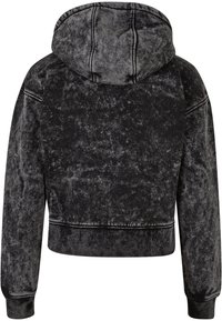 Sweat à capuche en velours noir écrasé avec manches longues, coutures visibles, poignets et ceinture côtelés, vu de dos.