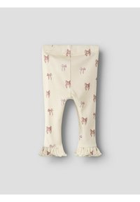 Crèmekleurige legging met een geribbelde textuur, versierd met roze strikprints en met een gerimpelde zoom voor extra detail.