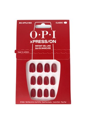Des ongles press-ons rouges dans un plateau en plastique, présentant une forme arrondie et une texture lisse. Emballés dans un carton rouge avec des lettres et des graphiques blancs.
