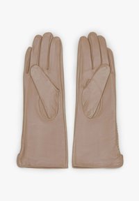 Beige leather gloves with elongated shape, four fingers, and a rounded thumb area. Smooth texture with stitched detailing along the edges.
