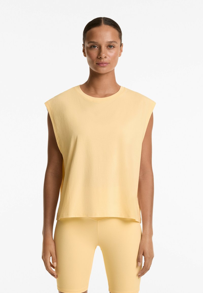 OYSHO SLEEVELESS SEAMLESS - Jednoduché tričko - yellow