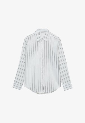 Chemise blanche à manches longues avec des rayures noires verticales, fermeture à boutons, col classique et ourlet arrondi. Tissu en mélange de coton.