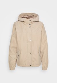 Béžová bunda s kapucí, předním zapínáním na druky, elastickými manžetami a dvěma bočními kapsami; vyrobená z hladkého materiálu s matným povrchem.