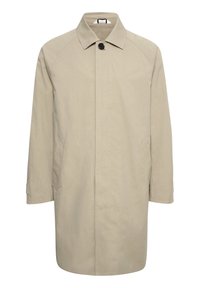 Beige trenchcoat med rak skärning, klassisk krage och en svart knapp. Har sidofickor och minimal sömnad.