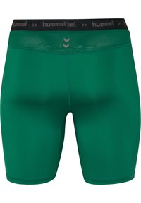 Groene sportieve shorts van een glad materiaal, met een zwarte elastische tailleband voorzien van het "hummel" logo en mesh accenten.