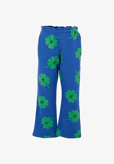 Pantaloni di cotone blu con vestibilità comoda, caratterizzati da un motivo a trifoglio verde e una vita elastica arricciata. Design a gamba svasata.