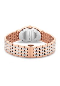 Orologio bicolore con cinturino in acciaio inossidabile e oro rosa. Cassa tondeggiante, retro rivestito in zaffiro, logo del brand inciso, superficie texturizzata.