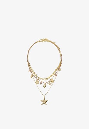 Gold layered necklace featuring sea-themed charms including starfish, shells, coins, and small beads on delicate chains.