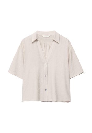 Svetlobéžová krátka košeľa s gombíkmi, s golierom a tromi prednými gombíkmi, vyrobená z textúrovaného materiálu.