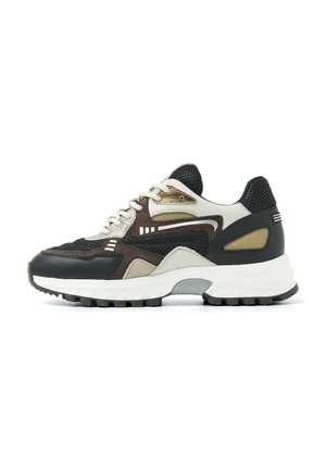 Sneakers with a mix of black, brown, and cream materials, featuring a textured mesh upper, prominent laces, and a chunky sole.
