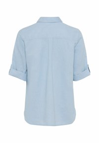 Light blue, short-sleeve shirt with a collared neckline, rolled cuffs, and a straight hem. Made from a soft, textured fabric.