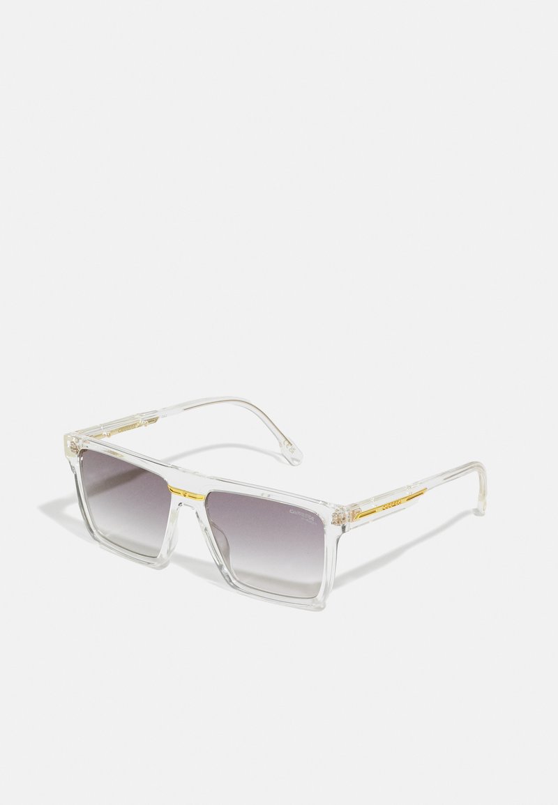 Ochelari de soare rectangulari, transparenti, cu lentile gri cu degradé, accente aurii pe punte și brațe transparente.