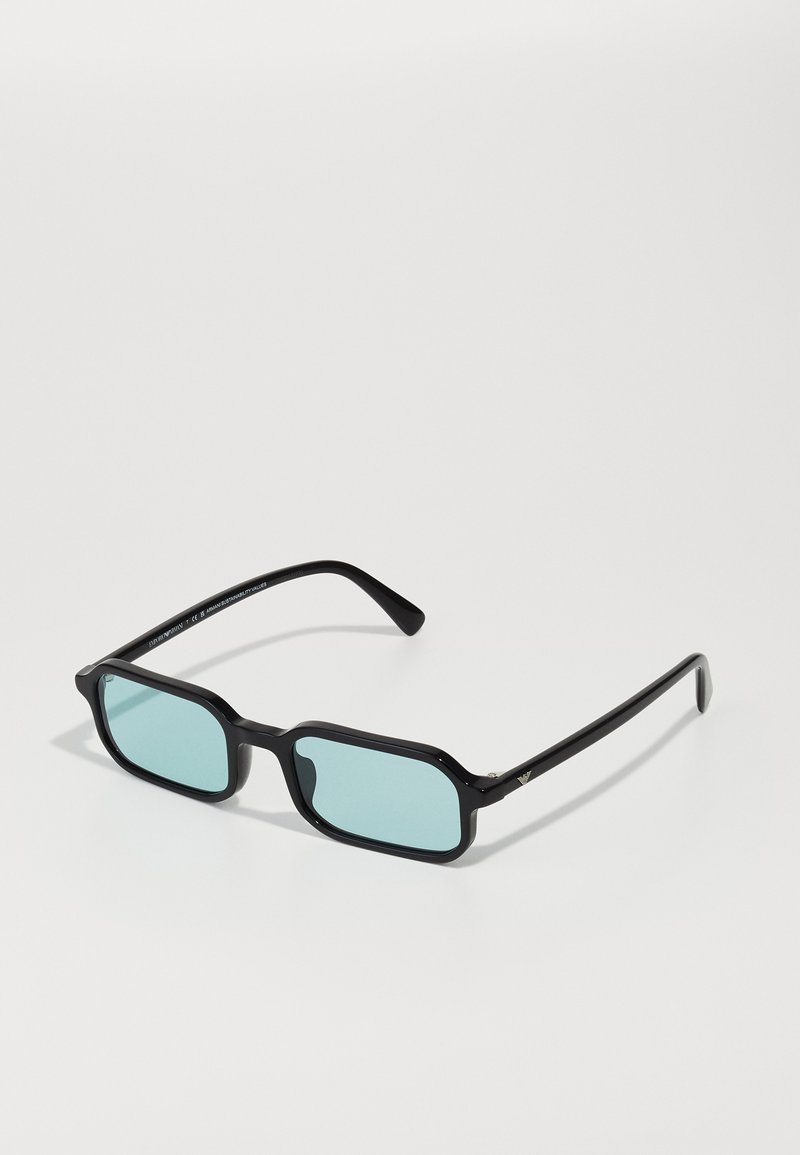 Black rectangular sunglasses with blue-tinted lenses; made of plastic with a smooth finish and subtle logo accent on the temple.