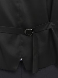 Black satin garment featuring a side tie with a buckle and a small split at the back. The fabric is smooth with a slight sheen.