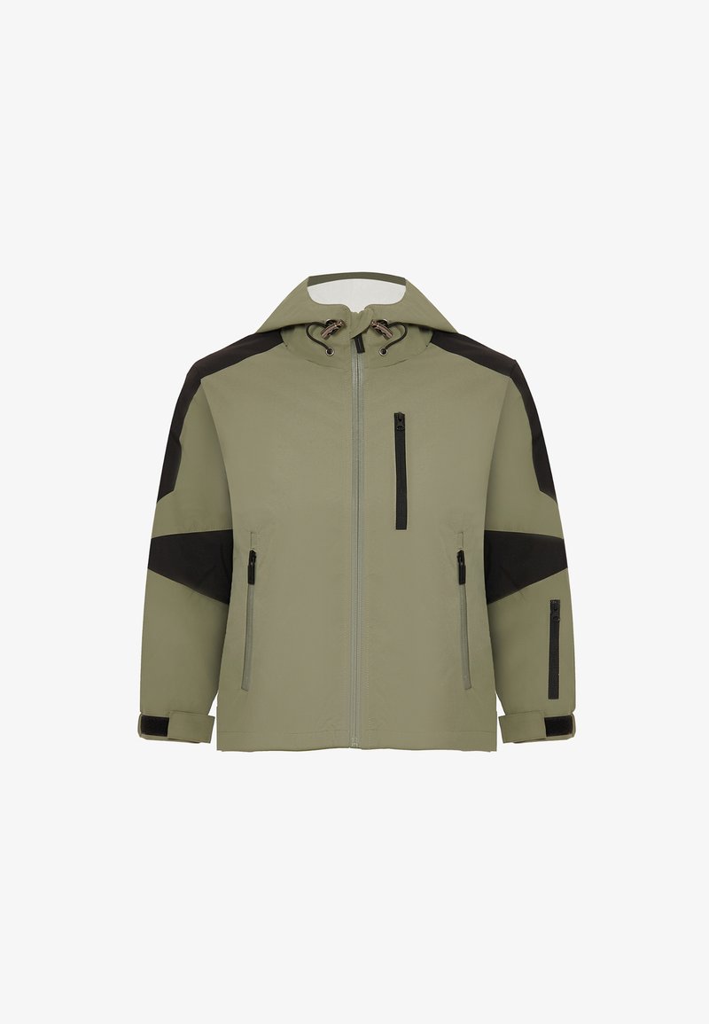 Veste vert olive avec des accents noirs, fermeture éclair sur le devant, capuche ajustable et plusieurs poches zippées sur la poitrine et les côtés. Texture lisse.