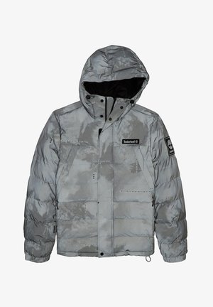 Harmaa toppatakin tikkivuorattu huppu, jossa Timberlandin logot rinnassa ja hihassa, vetoketju- ja nepparikiinnitys.