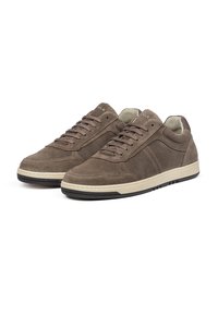 Brown suede athletic shoes with a low-top design, lace-up front, cream midsole, and black rubber outsole. Features side stitching accents.