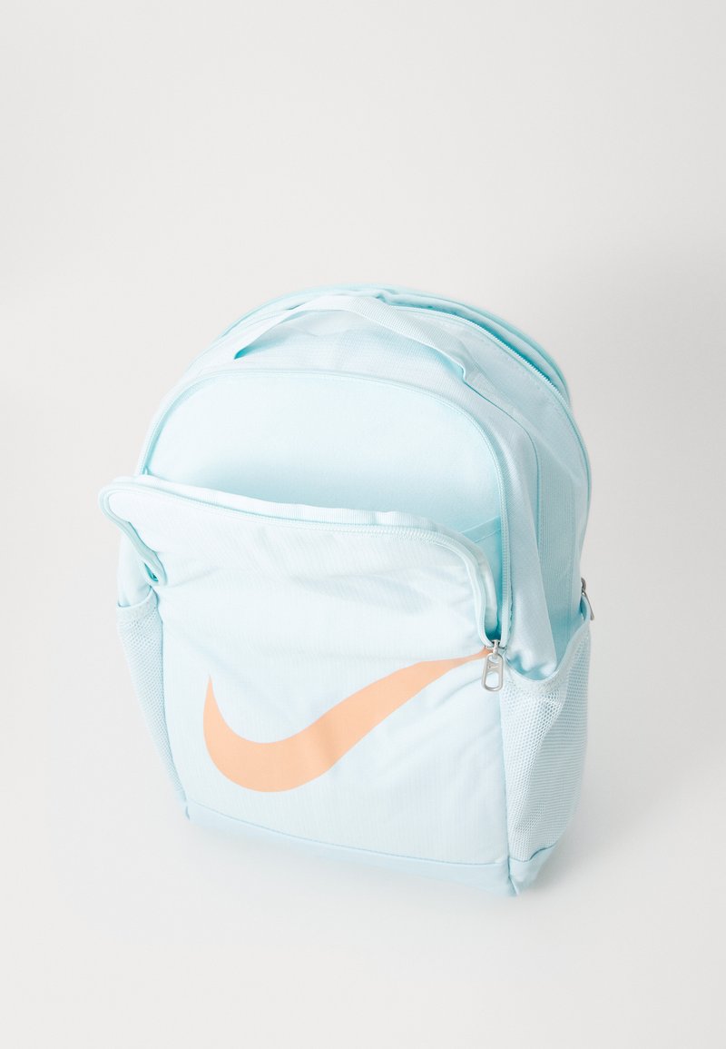 Nike Sportswear BRASILIA BACKPACK UNISEX - Rucksack - glacier blue/glacier  blue/(apricot agate)/blue - Zalando.co.uk
