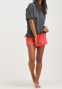 Ivy Park Pantaloni sportivi - coral