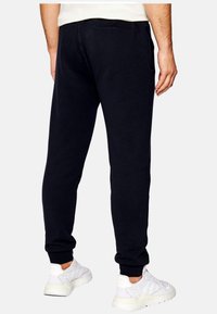 Guess ALDWIN  - Spodnji deli trenirk - azul