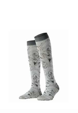 Knielange graue Socken mit schwarz-weißen detaillierten Rosenmustern und dunkelgrauen Bündchen, auf weißem Hintergrund stehend dargestellt.