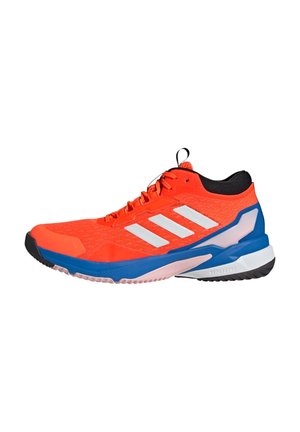 Bright orange athletic shoe with white stripes and black accents. Features a textured upper, cushioned sole, and a reinforced heel.