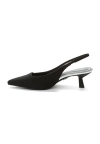Black slingback shoe with a pointed toe, textured fabric upper, low block heel, and a sleek, minimalist design.