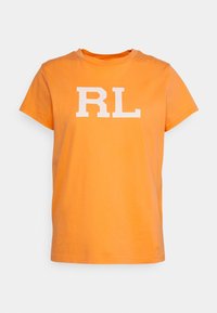 Orange bomull t-shirt med rund hals, korta ärmar och en vit "RL"-logotyp tryckt på framsidan. Slät textur, avslappnad passform.