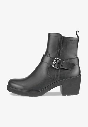 Black leather ankle boot with a smooth texture, curved shape, and a chunky heel. Features a strap with a silver buckle for detail.