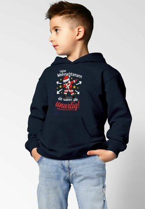 Navy blue hoodie featuring a graphic of Santa Claus with arrows and stars, and text reading "Lieber Weihnachtsmann die waren alle unartig!"