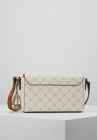 Cream leather crossbody bag with a textured surface, featuring a patterned design, brown accents, and a detachable small pouch.