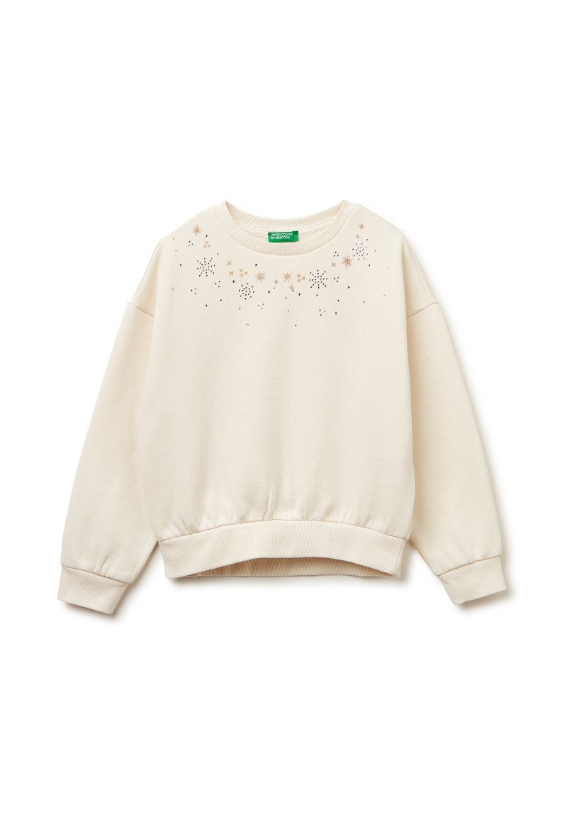 Felpa beige chiaro con scollatura rotonda, orlo arricciato e maniche lunghe decorate con stelle e puntini in oro e nero.