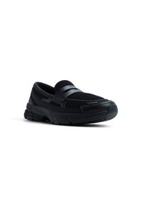 Scarpa nera slip-on con tomaia in rete, collo imbottito, fascia elastica sul dorso del piede e suola in gomma texturizzata per presa e supporto.