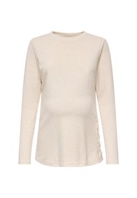 Μπεζ μακρυμάνικη μπλούζα εγκυμοσύνης με στρογγυλή λαιμόκοψη και πλευρικές λεπτομέρειες με κουμπιά σε λευκό φόντο.