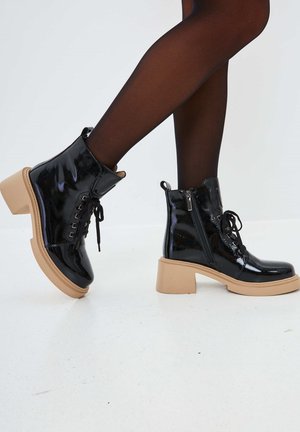 Platform ankle boots - black