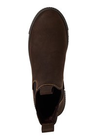 Botín de cuero marrón con textura suave, paneles laterales elásticos y una pestaña de tirón. Punta redondeada y suela de goma con un ligero patrón de dibujado.