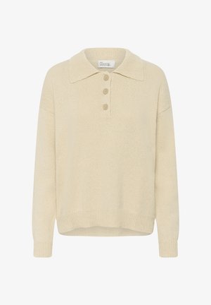 Bézs színű kötött hosszú ujjú pulóver lehajtott gallérral és három bézs gombbal az elülső középső részen.