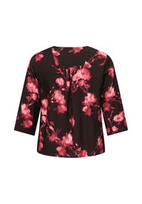 Floral blouse featuring a dark background with large pink flowers, three-quarter sleeves, round neckline, and relaxed fit.