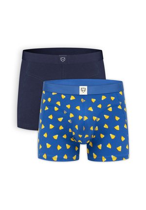 Dvoje pánskych boxeriek, jedny v jednofarebnej námorníckej modrej a druhé modré so žltým ovocným vzorom, obe s logom na páse.