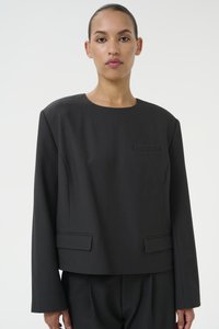 Svart cropped blazer med rund hals, lange ermer, to frontlommer og en strukturert design, laget av et teksturert stoff.