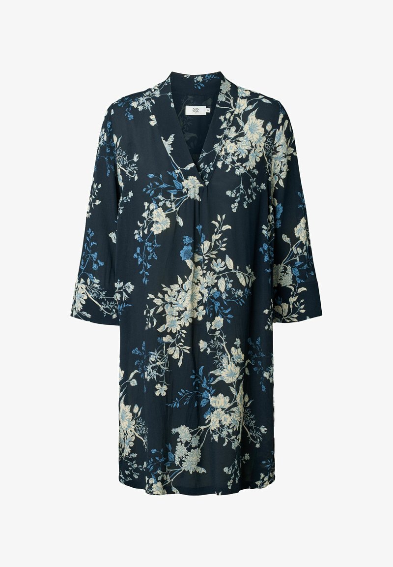 Kukkamekko tummansinisellä pohjalla, jossa on sinisiä ja kermaan värisiä kukkakuoseja. Mekossa on V-pääntie, kolmen neljänneksen hihat ja kevyestä kankaasta valmistettu malli.