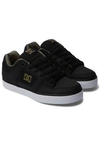 Black sneakers made of leather and mesh, featuring a white rubber sole, prominent logo, textured accents, and black laces.