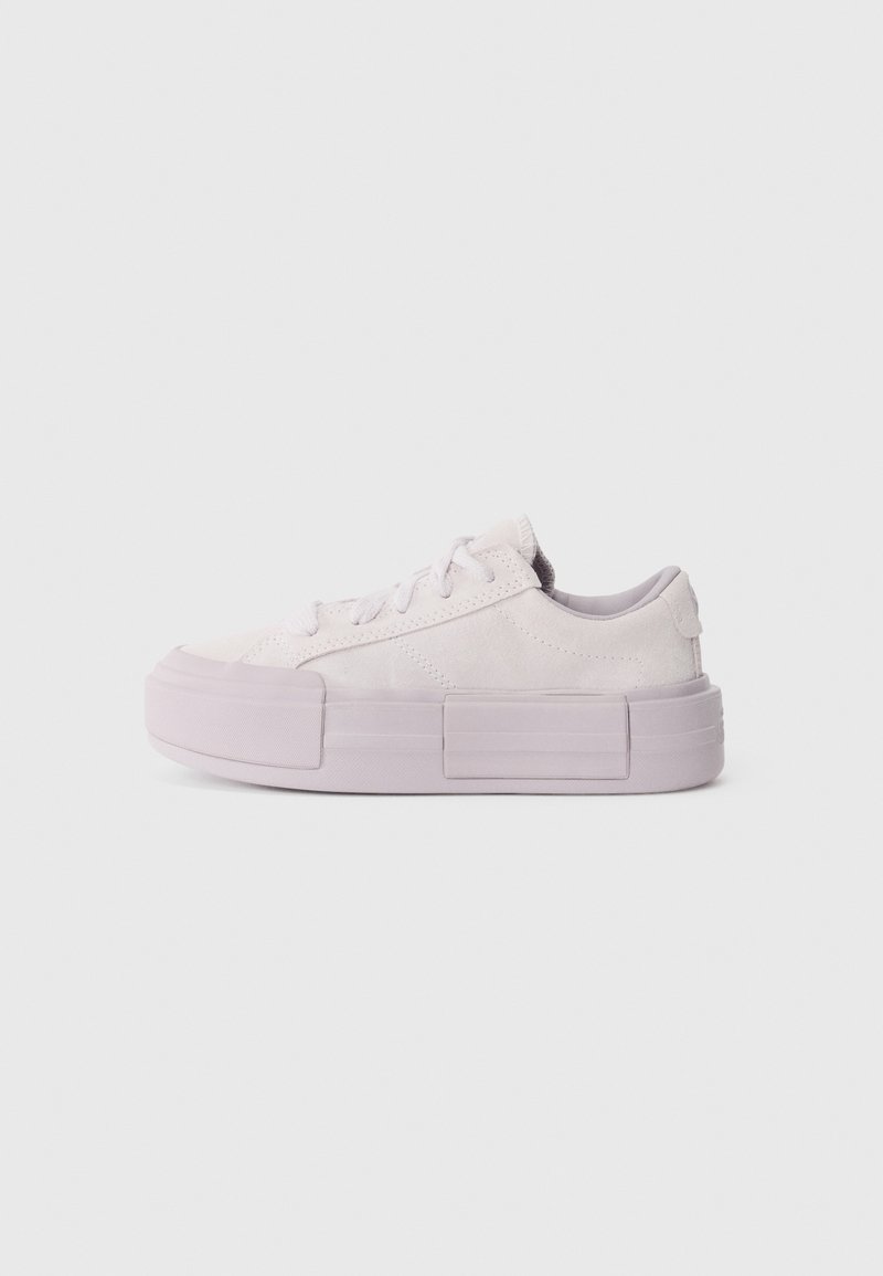 Light purple platform sneakers made of suede, featuring round toe, lace-up design, and textured side panels. Flat rubber sole, low profile.