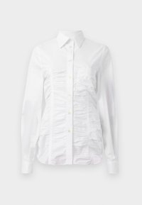 Atlasīts, white