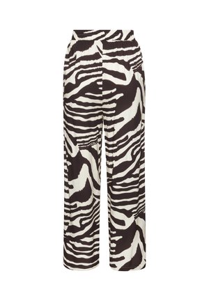 Weit geschnittene Hose mit schwarz-weißem Zebramuster und elastischem Bund vor weißem Hintergrund.